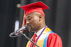 Samuel Kabeya speaks at Commencement.