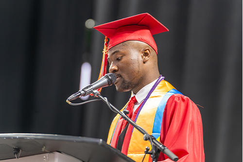Samuel Kabeya speaks at Commencement. 