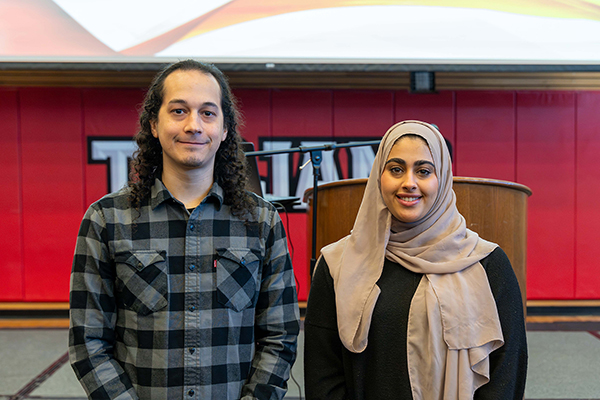 Everett Community College Foundation scholarship recipient Elishah Webb and Associated Student Body President Narjis Alshatee pose after speaking at the foundation benefit breakfast on April 16 at EvCC.