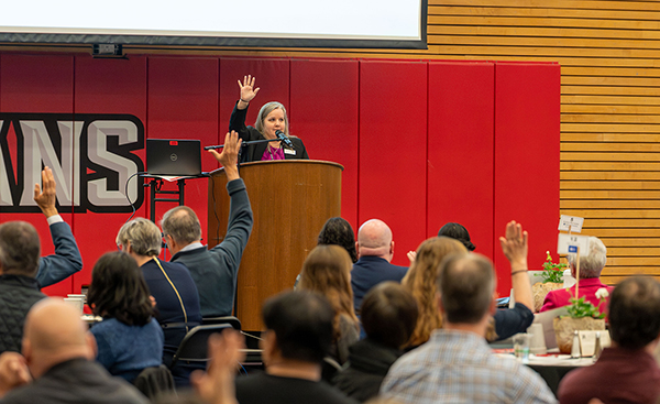 Kristen McConaha, Executive Director of the Everett Community College Foundation, speaks during the foundation benefit breakfast on April 16 at EvCC.