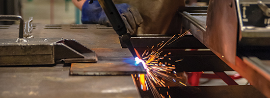 Welding metal with sparks. 