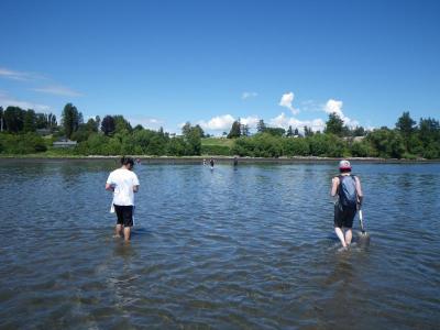 students wading in the water