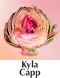 pink toned photo of a cross section of a flower with the text that reads Kyla Capp.