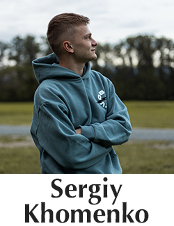 photo of a young man wearing a blue hoodie looking away from the camera over the name Sergiy Khomenko.