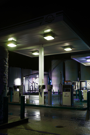 Shay Reichow- empty gas station with neon lights.