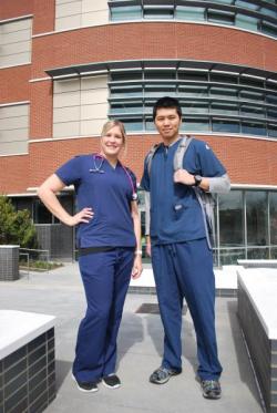 nursing students standing in front of Liberty Hall